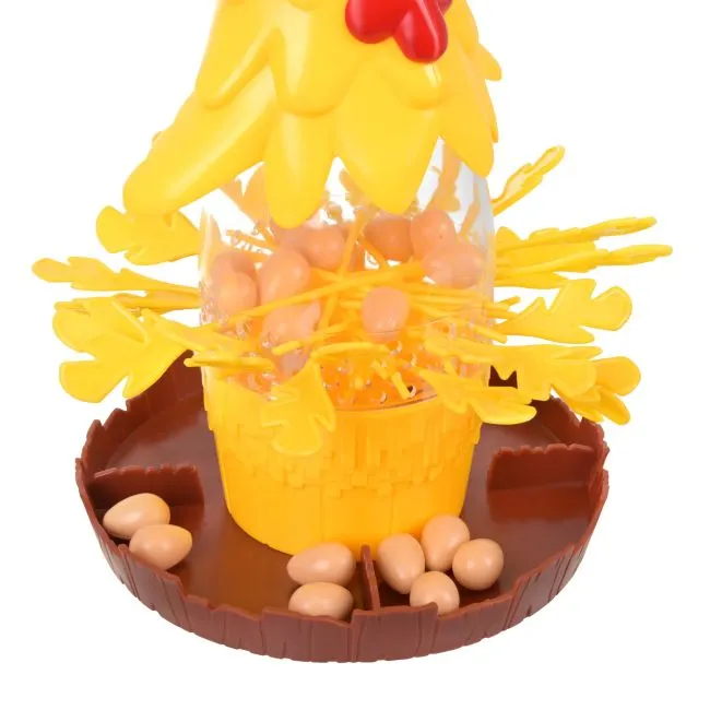 2026 09 1114 35 46 1.jpg Chicked Egg Drop, Družabna igra 3+, spretnostna igra z jajci in palčkami - slika 6